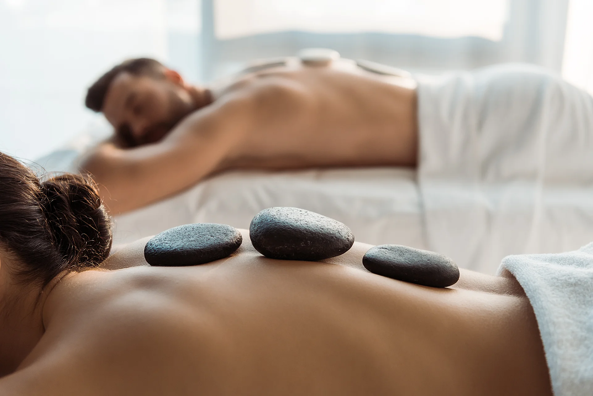 Aromatherapy oils and massage setup for a couples session at New Spa 7